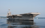 The Nimitz-class aircraft carrier USS John C. Stennis (CVN 74) transits Puget Sound Aug. 11, 2017. John C. Stennis is underway for sea trials three days ahead of schedule during a planned incremental availability (PIA) at Puget Sound Naval Shipyard and Intermediate Maintenance Facility. During PIA, the ship and shipyard team accomplished the largest work package ever for an aircraft carrier in a six-month availability.  (U.S. Navy photo by Mass Communication Specialist 3rd Class Dakota Rayburn)