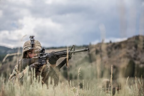 BRIDGEPORT, Calif. - U.S. Marine Pfc. Morris Jones, a motor transportation operator with Combat Logistics Battalion 5, Combat Logistics Regiment 1, 1st Marine Logistics Group, posts security during a combat physical training session during a field operation while participating in Mountain Training Exercise 4-17 at Marine Corps Mountain Warfare Training Center, Aug. 2, 2017. Marines participating in Mountain Training Exercise post security to demonstrate protecting various areas against any possible simulated attack or ambush in the mountainous terrain. (U.S. Marine Corps photo by Lance Cpl. Timothy Shoemaker)