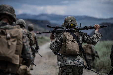 BRIDGEPORT, Calif. - U.S. Marines with Combat Logistics Battalion 5, Combat Logistics Regiment 1, 1st Marine Logistics Group, hike towards a target point to conduct a combat physical training session during Mountain Training Exercise 4-17 at Marine Corps Mountain Warfare Training Center in Aug. 2, 2017. During the Mountain Warfare Training Marines are required to complete multiple hikes, these are meant to keep Marines in peak physical condition during the exercise. (U.S. Marine Corps photo by Lance Cpl. Timothy Shoemaker)