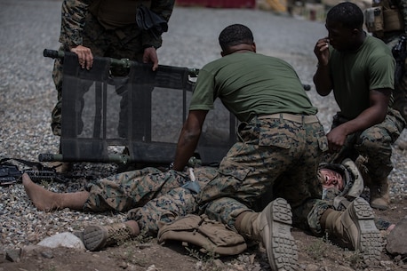 BRIDGEPORT, Calif. - U.S. Marine Pfc. Nelson Ramirez, a motor vehicle operator with Combat Logistics Battalion 5, Combat Logistics Regiment 1, 1st Marine Logistics Group, assumes the role of a casualty during a simulated casualty drill as part of Mountain Training Exercise 4-17 at Mountain Warfare Training Center, Aug. 2, 2017. Simulated casualty drills ensure Marines are capable of conducting first response casualty care. (U.S. Marine Corps photo by Lance Cpl. Timothy Shoemaker)