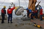 HEALY’s deck crew set a NOAA buoy in the Arctic Ocean in support of the 1701 science mission.