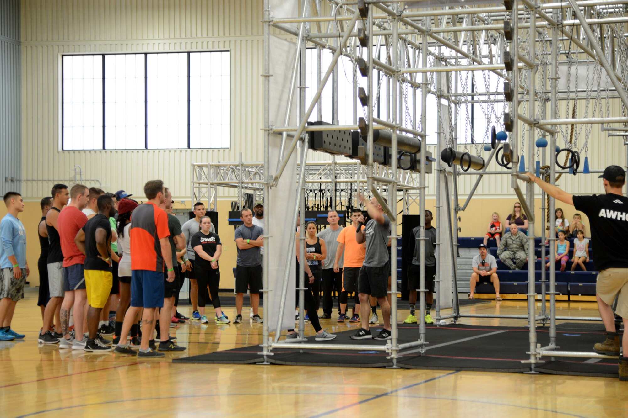 Competitors receive race instructions before an Alpha Warrior competition Aug. 9, 2017, at Malmstrom Air Force Base, Mont.