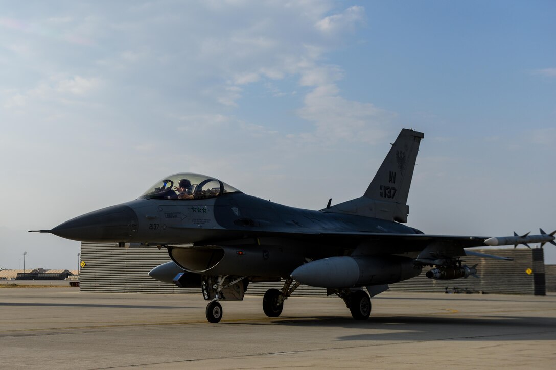 An aircraft taxis on a runway.