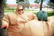 Tech. Sgt. Denise Flory, 302nd Airlift Wing historian, and her son prepare to wrestle wearing oversized sumo suits at the Capt. David Lyon Memorial Park during the Reserve wing’s annual Family Day event at Peterson Air Force Base, Colo., Aug. 5, 2017. Family Day gives reservists an opportunity to bond with each other and their families. The afternoon was packed with a variety of things to do for families including bounce houses, sumo suits, a dunk tank and a picnic lunch. (U.S. Air Force photo/Staff Sgt. Frank Casciotta)