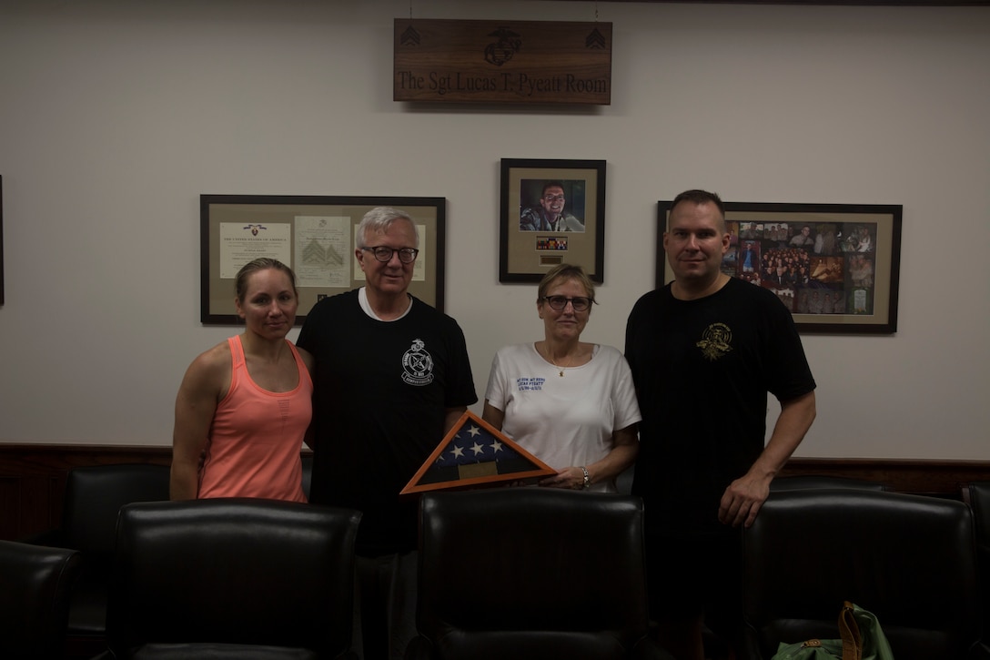 Major Sasha Kuhlow, Scott and Cindy Pyeatt, and Lieutenant Colonel Brad Bean pose for a photo after the Run to Remember memorial run at Camp Lejeune, N.C. Aug 5, 2017. The run is held every first Saturday of August in honor of Sgt. Lucas Pyeatt, a cryptologic linguist killed in action during Operation Enduring Freedom, February 2011, and other service members killed in action.