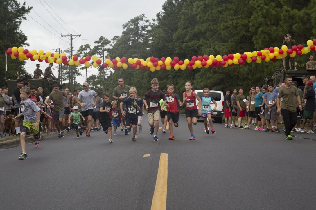 Participants take off from the starting line during the Run to Remember memorial run at Camp Lejeune, N.C. Aug 5, 2017. The run is held every first Saturday of August in honor of Sgt. Lucas Pyeatt, a cryptologic linguist killed in action during Operation Enduring Freedom, February 2011, and other service members killed in action.