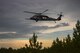 Airmen from the 38th and 41st Rescue Squadrons fly in an HH-60G Pave Hawk during combat search and recovery training as part of Stealth Guardian, Aug. 10, 2017, in the skies over the Apalachicola National Forest, Fla. Stealth Guardian allowed 5th generation fighters to integrate into Air Force rapid rescue capabilities during a five-day exercise. (U.S. Air Force photo by Staff Sgt. Ryan Callaghan)
