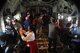 Civilian employers take photos onboard a C-130 Hercules orientation flight during the 302nd Airlift Wing’s annual Employer Appreciation Day at Peterson Air Force Base, Colo., Aug. 4, 2017. Employer Appreciation Day aims to educate civilian employers on the missions of the Air Force Reserve. (U.S. Air Force photo/Staff Sgt. Frank Casciotta)
