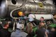 Master Sgt. Jason Harvey, a 302nd Operations Group C-130 loadmaster, explains how the U.S. Forest Service’s Modular Airborne Fire Fighting System is used to contain wildfires to a group of civilian employers during the 302nd Airlift Wing’s annual Employer Appreciation Day, at Peterson Air Force Base, Colo., Aug. 4, 2017. Employer Appreciation Day aims to educate civilian employers on the missions of the Air Force Reserve. (U.S. Air Force photo/Staff Sgt. Frank Casciotta)