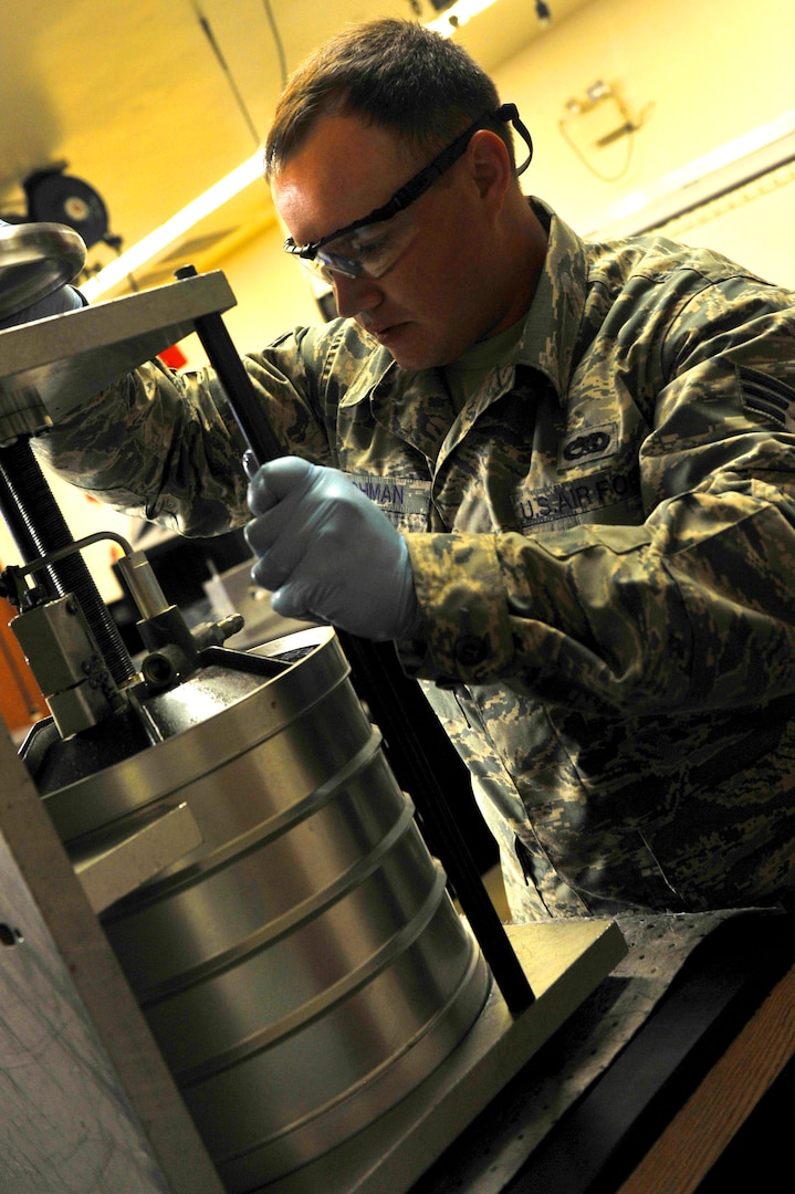 Senior Airman Seven Lohman, 56th Component Maintenance Squadron hydraulics journeyman, disassembles an A-10 Thunderbolt reservoir at Luke Air Force Base, Ariz. August 8, 2017. The reservoir stores the pressure fluid on the aircraft allowing it to turn and steer.  (U.S. Air Force photo/Airman 1st Class Pedro Mota)