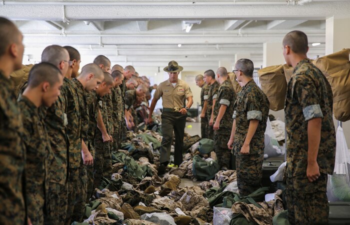 Recruits from Hotel Company, 2nd Recruit Training Battalion, undergo an initial gear inspection during pick up at Marine Corps Recruit Depot San Diego, Aug. 11.