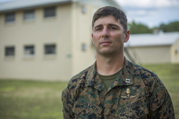 Capt. John Howarth the company operations liaison officer with Echo Company, 4th Reconnaissance Battalion, 4th Marine Division, Marine Forces Reserve, stands outside Echo Company’s barracks at Camp Grayling Joint Maneuver Training Center, Michigan, during exercise Northern Strike 17, Aug. 9, 2017.
