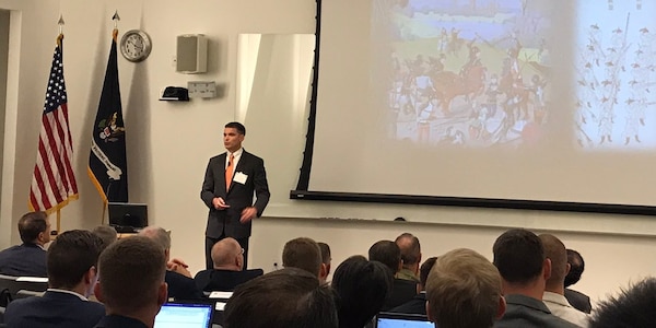 Maj. Mathison Hall, a detachment commander with 2nd Civil Affairs Group and a senior analyst at the Jonhns Hopkins University Applied Physics Laboratory, presents his feature at the annual U.S. Army Mad Scientist conference at Georgetown University, July 25-26, 2017