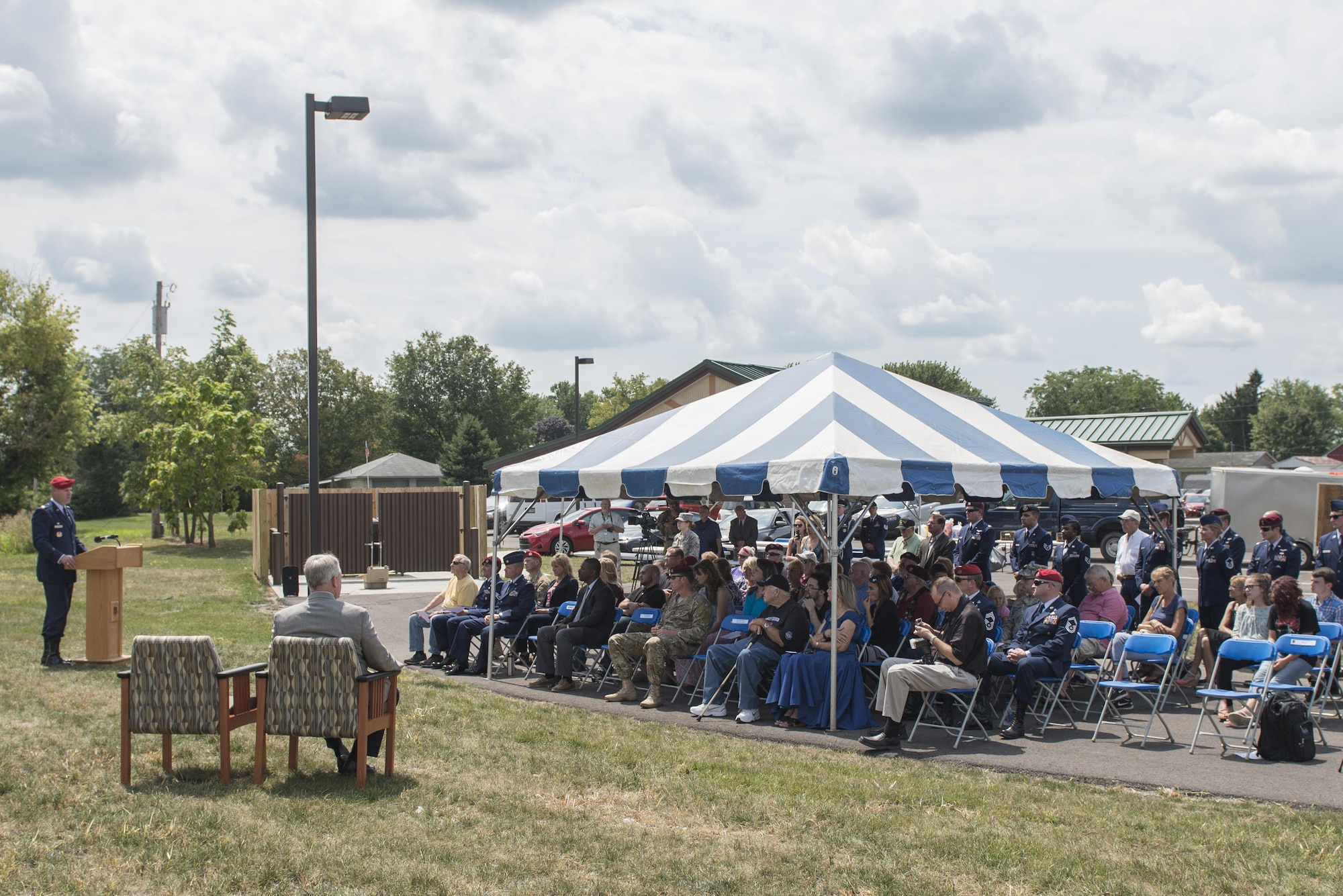 Col. Michael Martin speaks during a ceremony dedicating a six-mile stretch of Highway 121 in honor of Master Sgt. William L. McDaniel II's namesake in Greenville, Ohio, Aug. 14, 2017. McDaniel was a a Special Tactics pararescueman who was killed when the MH-47 Chinook helicopter he was in crashed in the Philippines Feb. 22, 2002. A pararescueman’s unique technical rescue skill sets are utilized during humanitarian and combat operations; they deploy anywhere, anytime, employ air-land-sea tactics into restricted environments to authenticate, extract, treat, stabilize and evacuate injured or isolated personnel. (U.S. Air Force photo by Wesley Farnsworth)