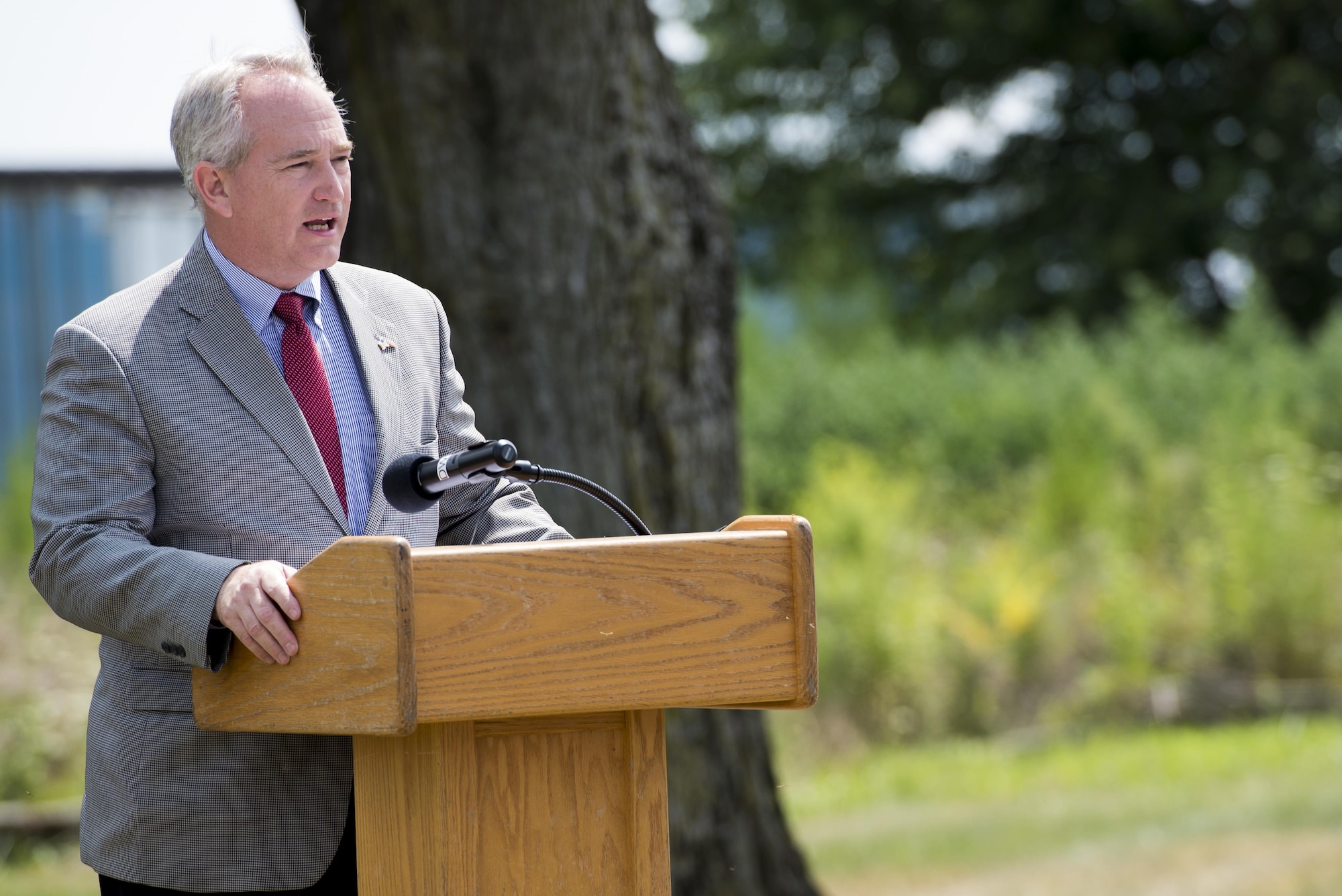 Ohio State Representative Keith Faber speaks during a ceremony dedicating a six-mile stretch of Highway 121 in honor of Master Sgt. William L. McDaniel II's namesake in Greenville, Ohio, Aug. 14, 2017. McDaniel was a a Special Tactics pararescueman who was killed when the MH-47 Chinook helicopter he was in crashed in the Philippines Feb. 22, 2002. A pararescueman’s unique technical rescue skill sets are utilized during humanitarian and combat operations; they deploy anywhere, anytime, employ air-land-sea tactics into restricted environments to authenticate, extract, treat, stabilize and evacuate injured or isolated personnel. (U.S. Air Force photo by Wesley Farnsworth)