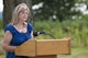 Sheila McDaniel, the mother of Master Sgt. William L. McDaniel II, provides remarks following a ceremony dedicating a six-mile stretch of Highway 121 in honor of her son's namesake, in Greenville, Ohio, Aug. 14, 2017. McDaniel was part of a joint, special operations team who were infiltrating an island in Southern Philippines when the MH-47 Chinook helicopter he was in crashed into the Sulu Sea Feb. 22, 2002. (U.S. Air Force photo by Wesley Farnsworth)