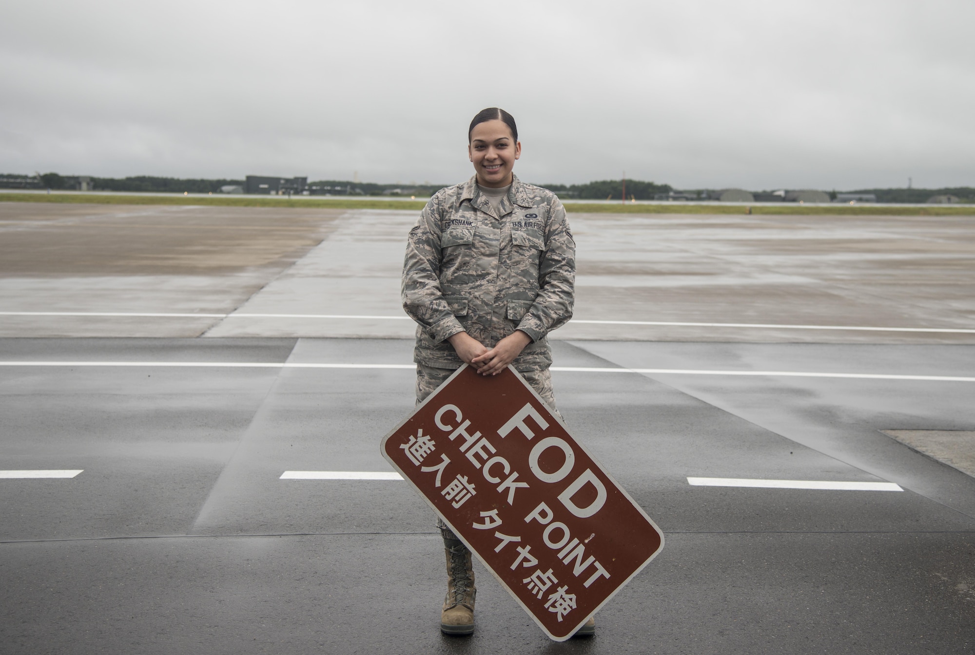 Posing with FOD sign