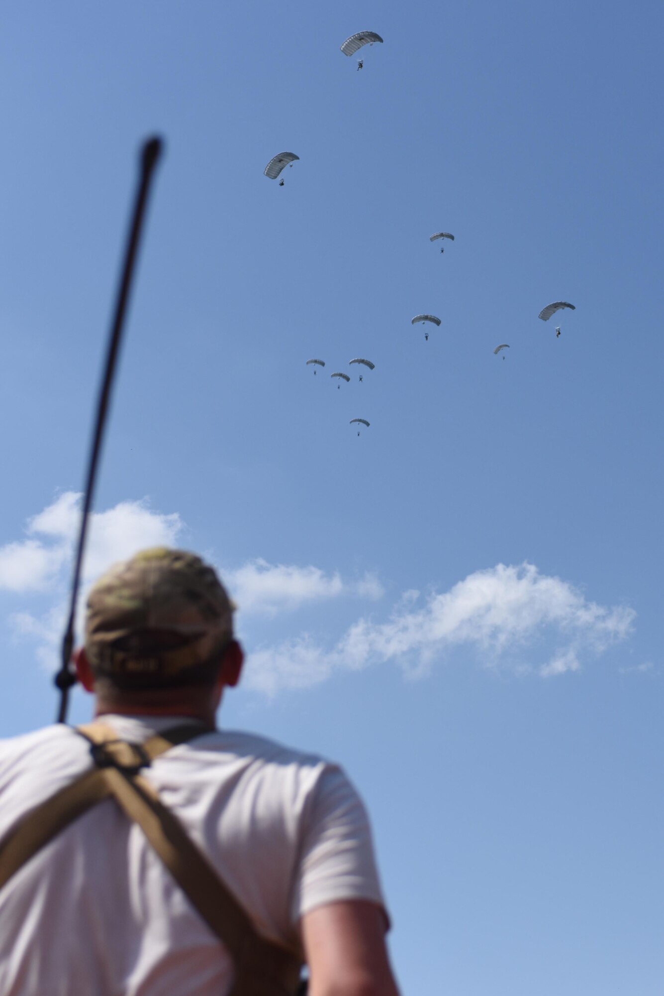 A Guardian Angel team from the 57th Rescue Squadron perform a freefall jump during exercise Ares Shadow near Aviano, Italy, Aug. 9. A Guardian Angel team consists of both pararescuemen and combat rescue officers, both specializing in personnel recovery operations. (U.S. Air Force photo/Airman 1st Class Eli Chevalier)