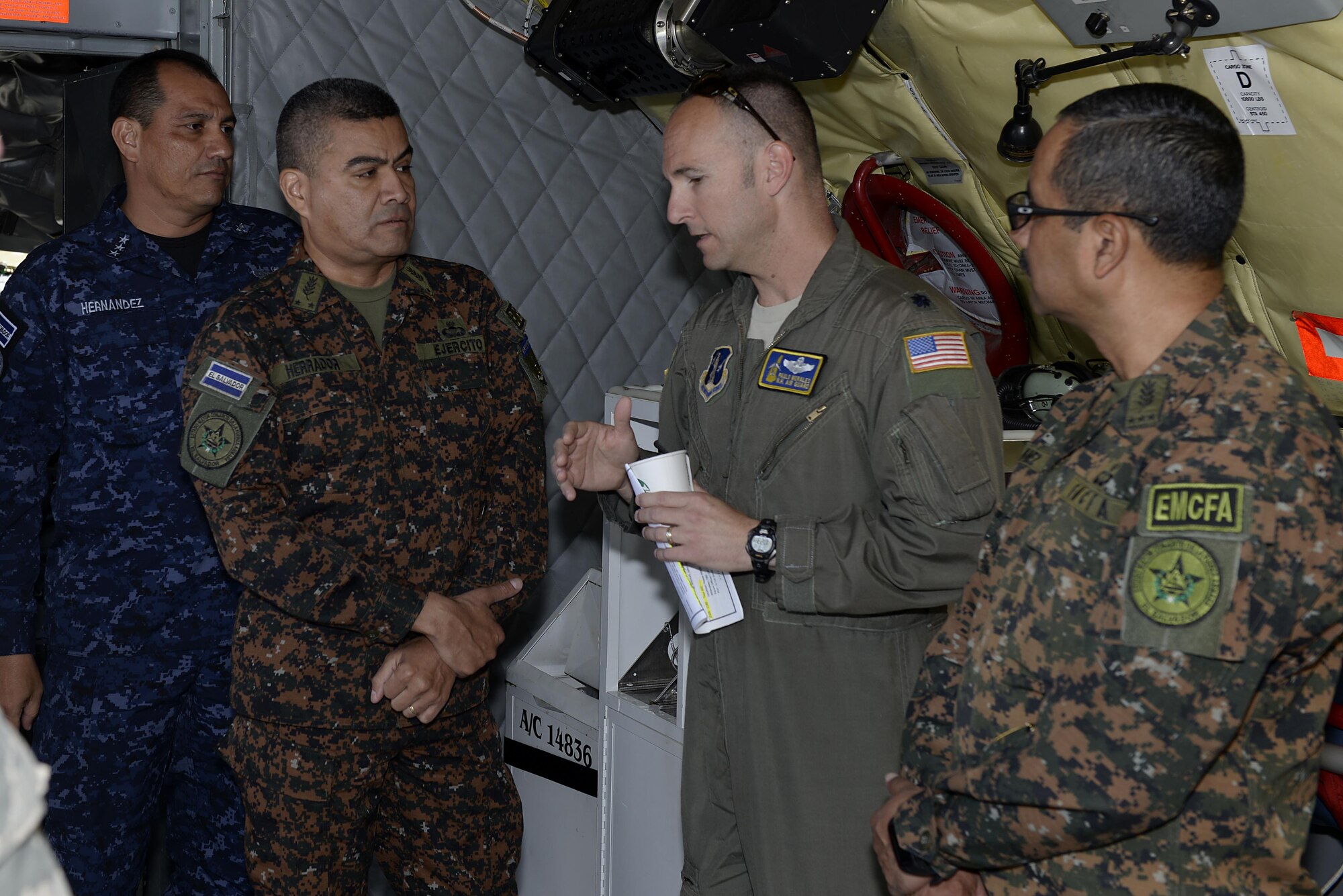 U.S. Air National Guard Lt. Col. Paulo A. Morales, a 133rd Air Refueling Squadron flight commander, translates for members of the Salvadoran armed forces on August 10, 2017 at Pease Air National Guard Base, N.H.