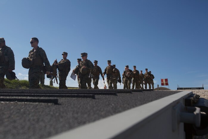 Marines drive a medium tactical vehicle replacement to a staging area during a maritime prepositioning force exercise at Blount Island, Fla., Aug. 10 - 11, 2017.