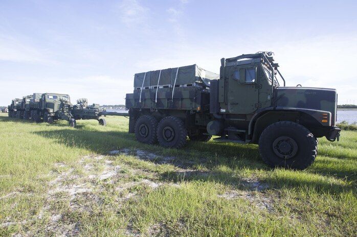 Marines drive a medium tactical vehicle replacement to a staging area during a maritime prepositioning force exercise at Blount Island, Fla., Aug. 10 - 11, 2017.