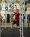 Senior Airman Jonathan Lane, 315th Airlift Wing Public Affairs,, tries out the Alpha Warrior Battle Rig’s obstacles during its introduction on the Globemaster Court at the Air Base Fitness and Sports Center on Joint Base Charleston, S.C., Aug. 5.