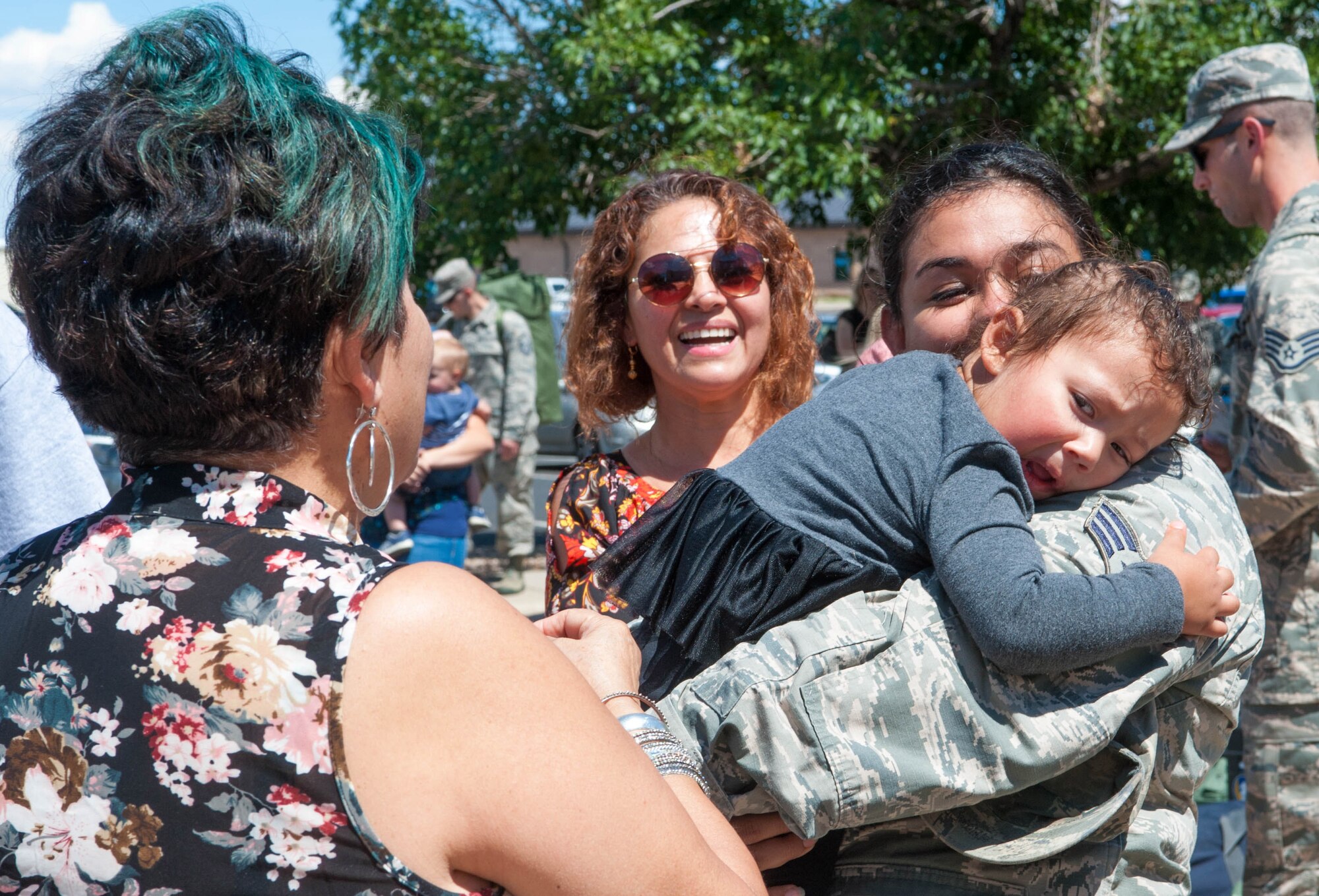 Family greets deployed  Airman upon her return home