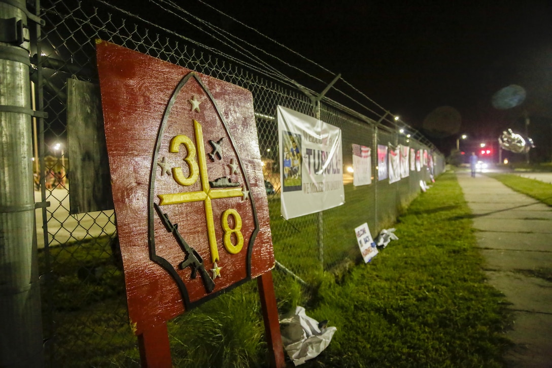 Signs and banners made by friends and families hang on the fences surrounding the compound at Camp Lejeune, N.C., August 12, 2017. Marines and Sailors returned from a 6-month Unit Deployment Program in Okinawa, Japan. V38 conducted exercises in Okinawa, Mainland Japan, South Korea, Thailand, the Philippines, Guam and other smaller islands. (U.S. Marine Corps photo by Lance Cpl. Leynard Kyle Plazo)