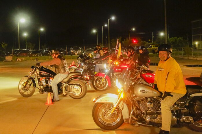 Bikers park their vehicles after escorting the buses carrying the Marines at Camp Lejeune, N.C., August 12, 2017. Marines and Sailors returned from a 6-month Unit Deployment Program in Okinawa, Japan. V38 conducted exercises in Okinawa, Mainland Japan, South Korea, Thailand, the Philippines, Guam and other smaller islands.  (U.S. Marine Corps photo by Lance Cpl. Leynard Kyle Plazo)