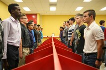 Recruits from Mike Company, 3rd Recruit Training Battalion, receive a contraband brief during receiving at Marine Corps Recruit Depot San Diego, Aug. 14.