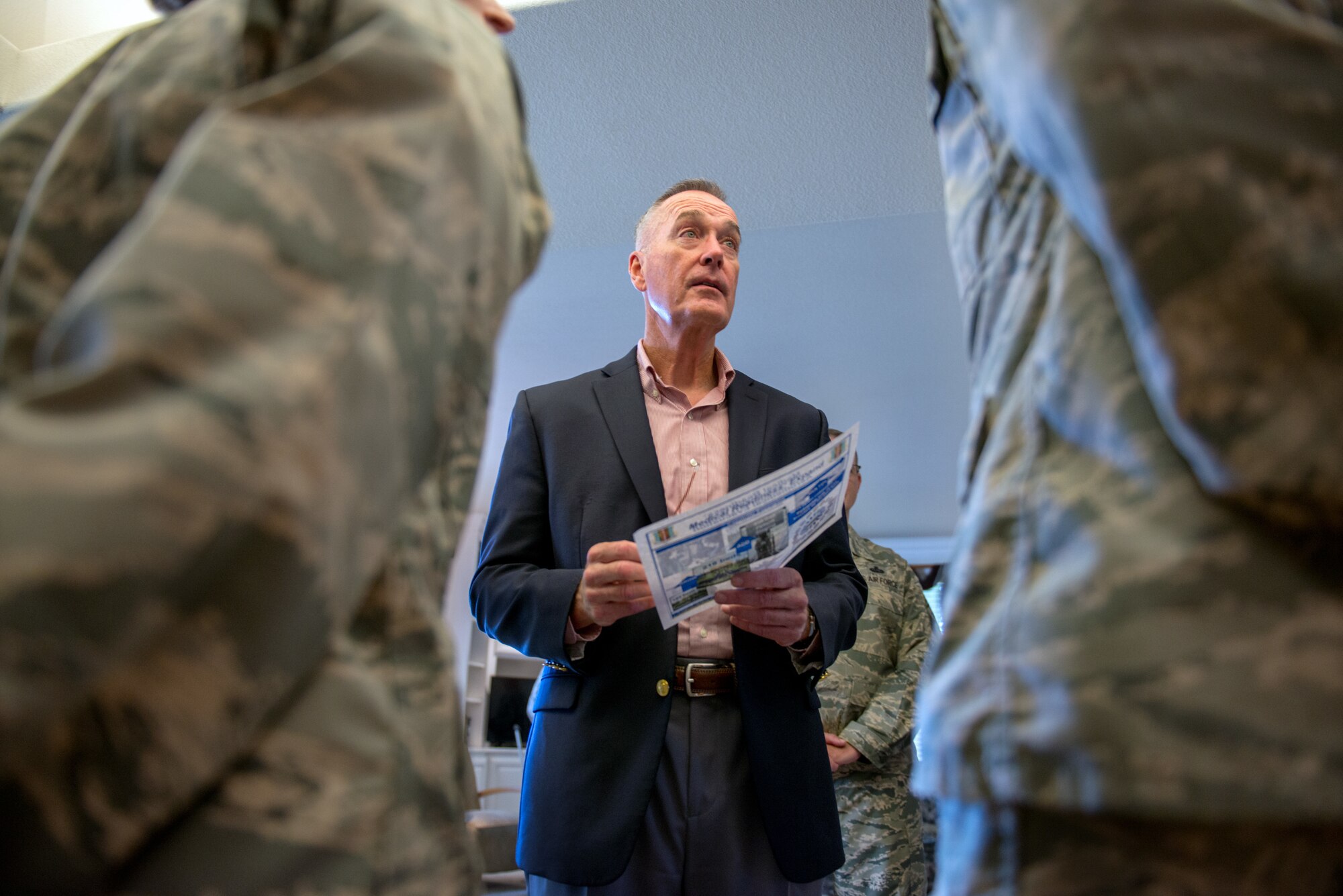 U.S. Air Force Col. John Klein, 60th Air Mobility Wing commander, talks with Marine Corps Gen. Joseph F. Dunford Jr., Chairman of the Joint Chiefs of Staff, during a gas and go at Travis Air Force Base, Calif., Aug, 10, 2017. (U.S. Air Force photo by Louis Briscese)