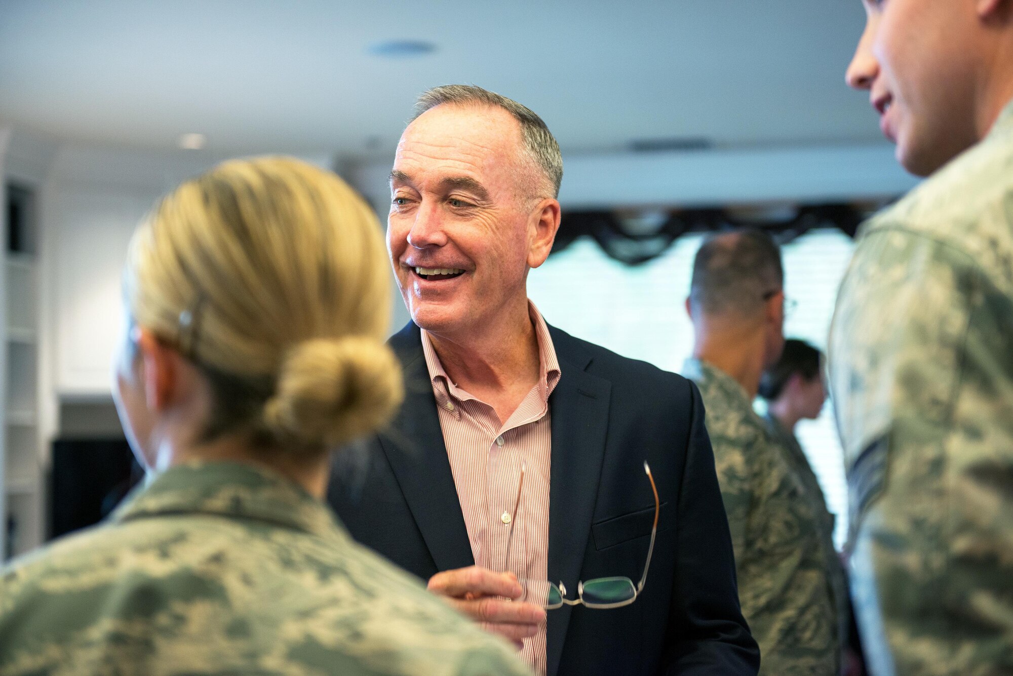 U.S. Air Force Col. John Klein, 60th Air Mobility Wing commander, talks with Marine Corps Gen. Joseph F. Dunford Jr., Chairman of the Joint Chiefs of Staff, during a gas and go at Travis Air Force Base, Calif., Aug, 10, 2017. (U.S. Air Force photo by Louis Briscese)
