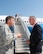 U.S. Air Force Col. John Klein, 60th Air Mobility Wing commander, talks with Marine Corps Gen. Joseph F. Dunford Jr., Chairman of the Joint Chiefs of Staff, during a gas and go at Travis Air Force Base, Calif., Aug, 10, 2017. (U.S. Air Force photo by Louis Briscese)