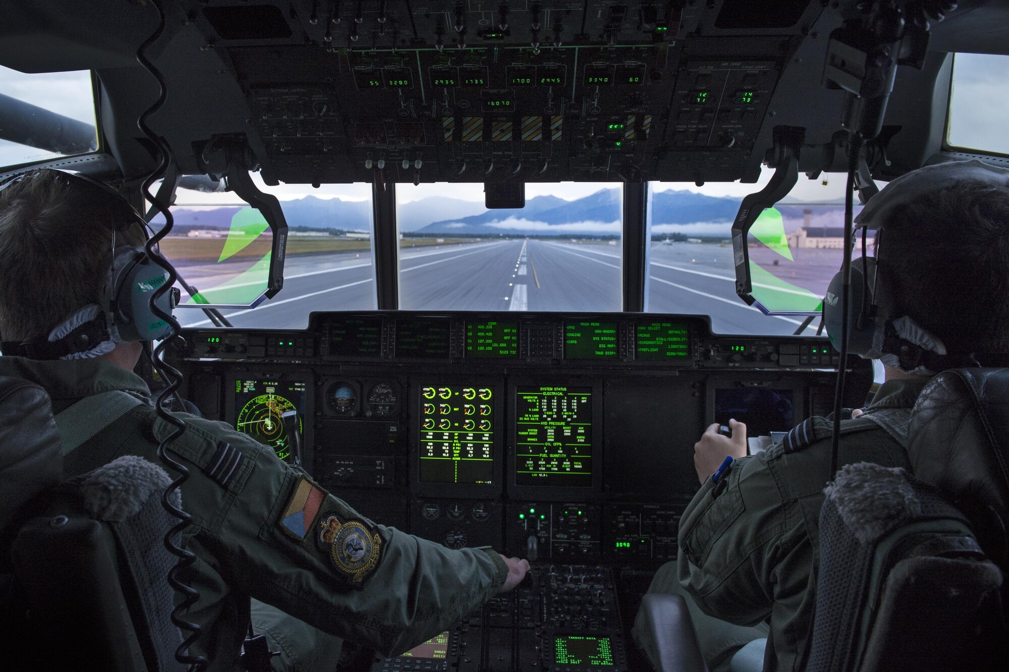 Pilots of the British Royal Air Force 47th Squadron propel down the flightline in their C-130 Hercules at Joint Base Elmendorf-Richardson, Alaska, Aug. 11, 2017. The RAF airmen are at JBER for training exercise Red Flag-Alaska 17-3.