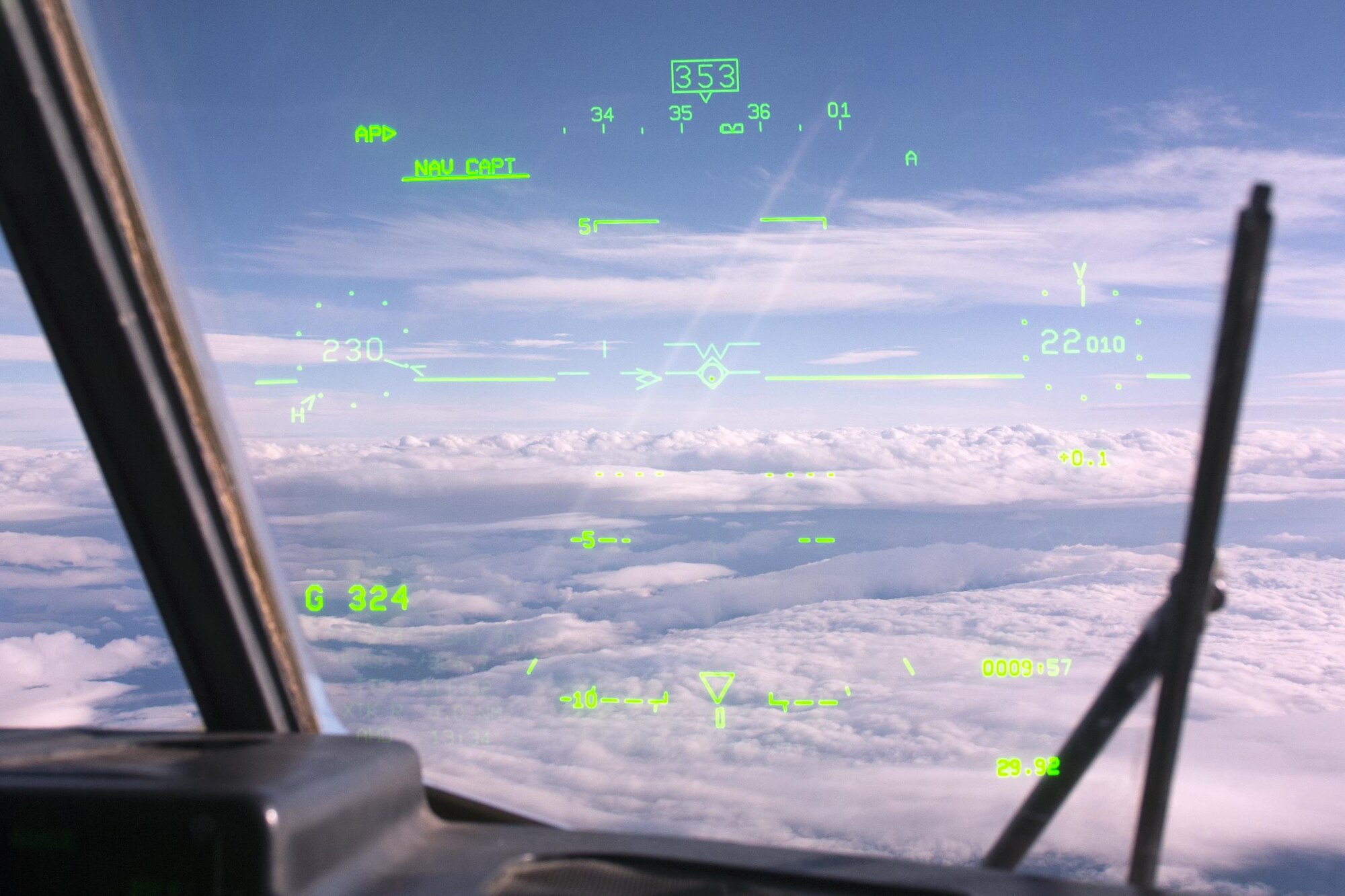 Clouds blanket the Alaska interior through the heads-up display in a British Royal Air Force C-130 Hercules, Aug. 11, 2017. The RAF airmen are at JBER for training exercise Red Flag-Alaska 17-3.