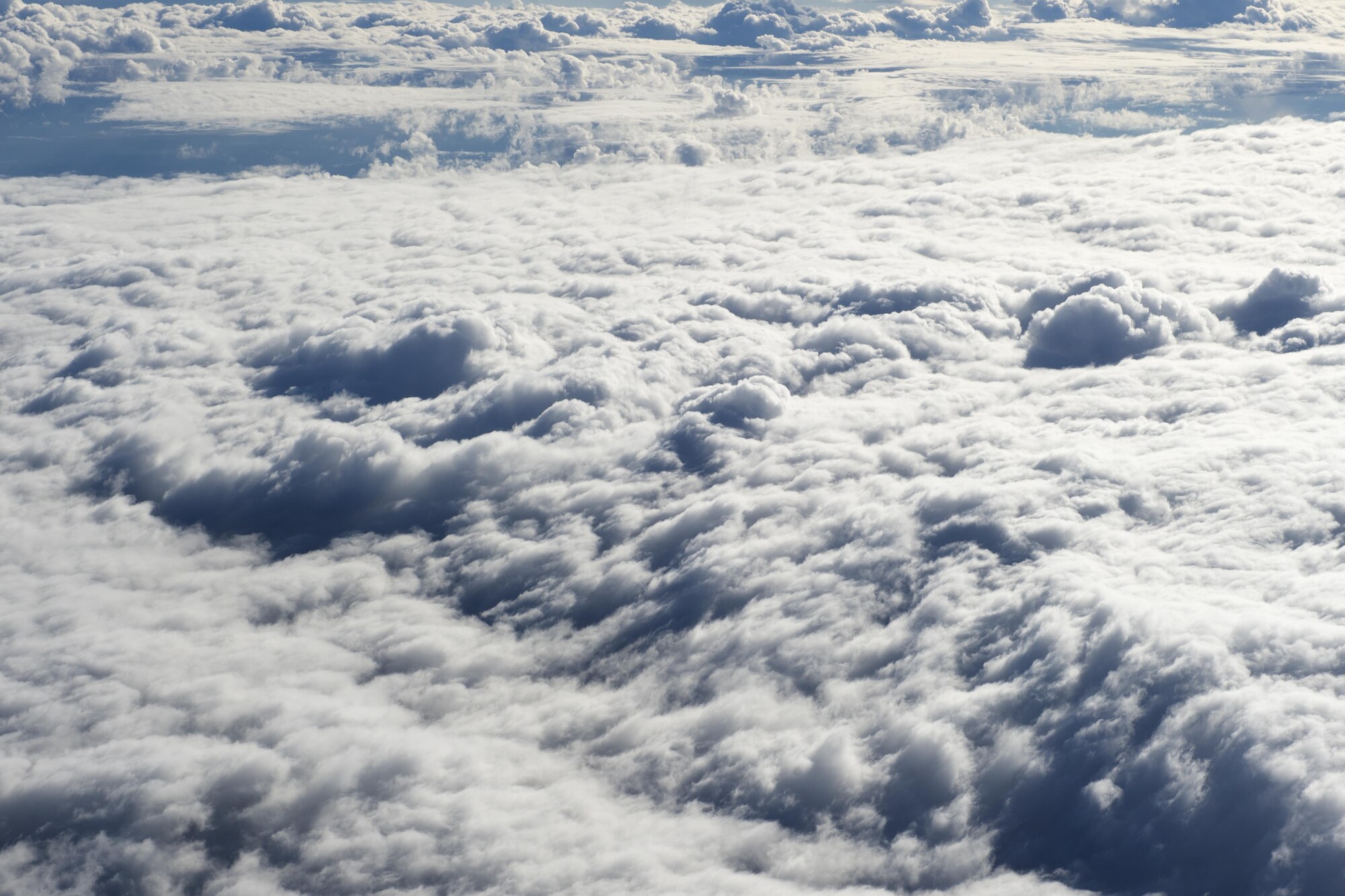Clouds blanket the Alaska interior outside a British Royal Air Force C-130 Hercules, Aug. 11, 2017. The RAF airmen are at JBER for training exercise Red Flag-Alaska 17-3.