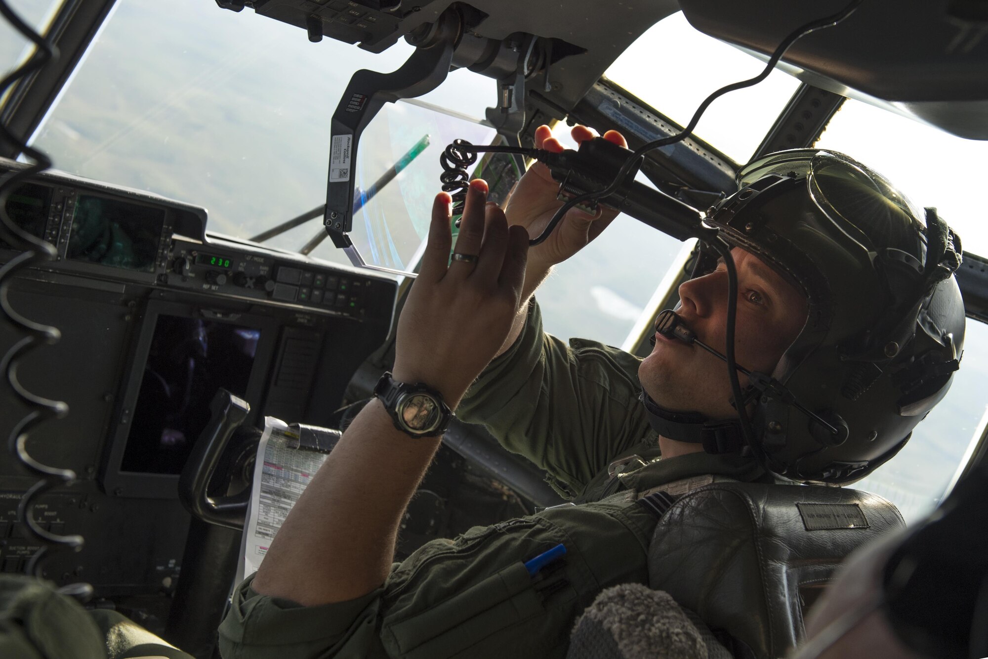 Flight Lieutenant Steve Hicks, re-connects his headset during Red Flag 17-3 training exercise Aug. 11, 2017. Red Flag participants are organized into "red" aggressor forces and "blue" coalition forces. "white" forces represent the neutral controlling agency – RAF participants in this portion of the exercise were the blue forces.