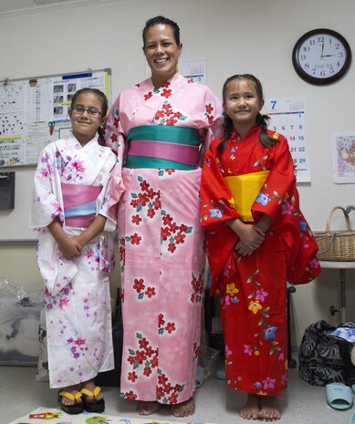 Americans dance with Japanese locals to honor ancestors