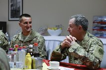 Air Force Chief of Staff Gen. David L. Goldfein, right, visits with Senior Master Sgt. Jeremy Kreibich, 379th Expeditionary Maintenance Squadron lead production superintendent, following lunch at Al Udeid Air Base, Qatar, Aug. 15, 2017. Over the course of the day, Goldfein took time to visit with Airmen and observe many of the critical military assets assigned to the base. (U.S. Air Force photo by Tech. Sgt. Bradly A. Schneider)