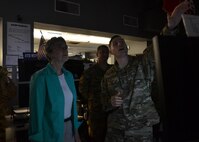 Secretary of the Air Force Heather Wilson listens to 1st Lt. Kyle Duran, 609th Air Operations Center, during a tour of the Combined Air Operations Center at Al Udeid Air Base, Qatar, Aug. 15, 2017. Wilson visited with multiple Airmen, learning about their contributions to air operations in the U.S. Central Command area of responsibility. (U.S. Air Force photo by Staff Sgt. Desiree Economides)