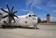 A U.S. Navy C-2A Greyhound sits on the flightline in front of the air traffic control tower on RAF Mildenhall, England, Aug. 2, 2017. Members of the U.S. Navy, VRC-40, from Norfolk, Va., were here as part of Exercise Saxon Warrior, a multinational joint maritime exercise involving 15 warships from five different nations, along with submarines, more than 100 aircraft and approximately 9,000 personnel. (U.S. Air Force photo by Karen Abeyasekere)