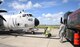 U.S. Air Force Airman Andrew Garibaldo, 100th Logistics Readiness Squadron, pumps fuel onto a U.S. Navy C-2A Greyhound Aug. 2, 2017, on RAF Mildenhall, England. Members of the U.S. Navy, VRC-40, from Norfolk, Va., were here as part of Exercise Saxon Warrior. The Greyhounds cannot be refueled in the air so they were refueled by truck while on the ground. (U.S. Air Force photo by Karen Abeyasekere)