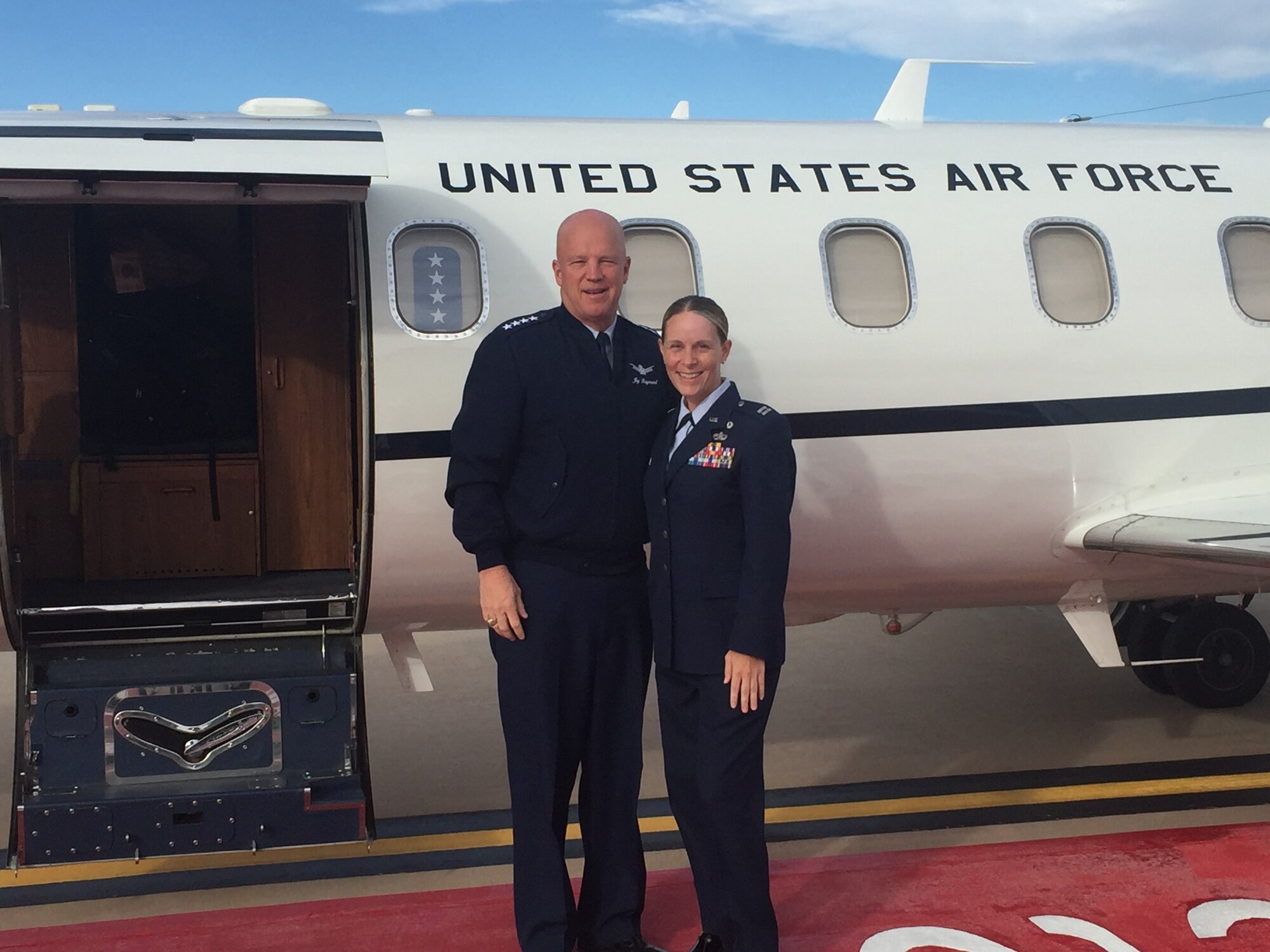 General Jay Raymond and Captain Jessica Jenkins pose before their flight to the District of Columbia.