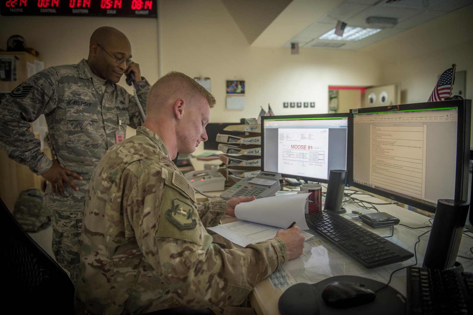 Senior Airman David Tiradeau, a ramp coordinator assigned to the 386th Expeditionary Logistics Readiness Squadron, relays information to the air terminal operations center, at an undisclosed location in Southwest Asia, August 15, 2017.