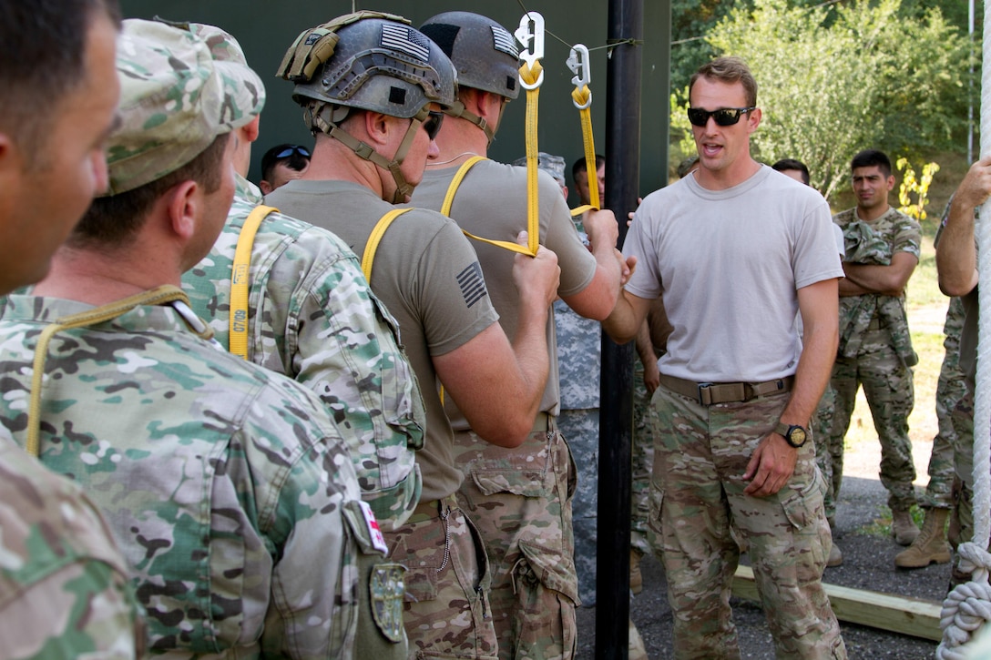 A jumpmaster leads U.S. and Georgian soldiers through sustained airborne training