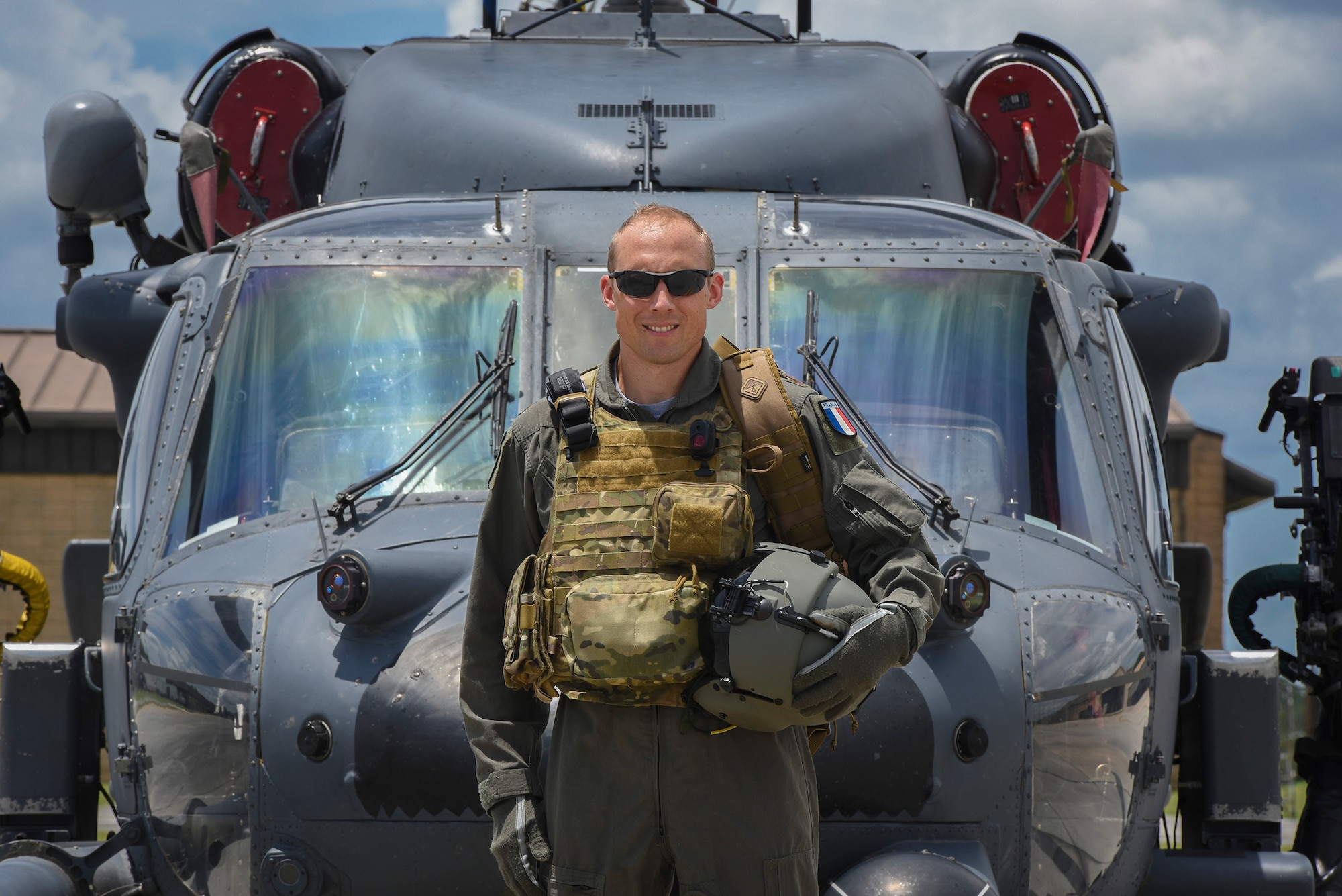 Commandant Micka, a French exchange pilot and assistant director of operations for Moody’s 41st Rescue Squadron, stands in front of an HH-60G Pavehawk, Aug. 2, 2017, at Moody Air Force Base, Ga. Prior to his arrival at the 41st RQS, Micka transitioned from flying the French Air Force’s EC-725 Caracal helicopter to learn the HH-60. Since his childhood, Micka aspired to serve and fly for the French and U.S. military as a rescue pilot. (U.S. Air Force photo by Senior Airman Greg Nash)