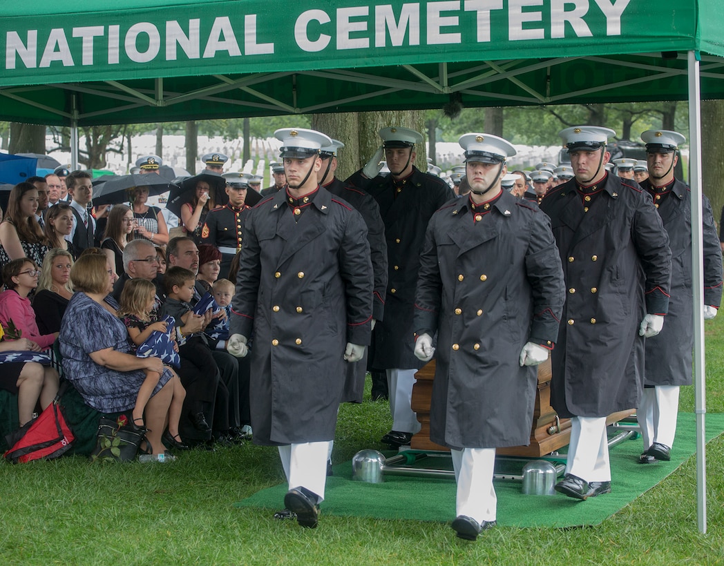 Marine Corps Body Bearers with Bravo Company, Marine Barracks Washington D.C., march off the gravesite at the conclusion of a funeral for Marine Sgt. Joseph J. Murray at Arlington National Cemetery, Arlington, Va., Aug. 15, 2017. Murray, 26, was one of the 15 Marines and one Navy sailor who perished when their KC130-T Hercules crashed in Mississippi, July 10, 2017. Murray was a Critical Skills Operator with the 2nd Raider Battalion, Marine Corps Forces Special Operations Command (MARSOC). (Official U.S. Marine Corps photo by Cpl. Robert Knapp/Released)