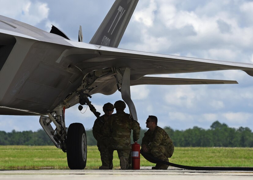 An F-22 Raptor from the 95th Fighter Squadron, Tyndall Air Force Base, Fla., receives fuel from a forward area refueling point from an HC-130J Combat King II during exercise Stealth Guardian at Moody Air Force Base, Ga., Aug. 10, 2017. The FARP program allows an HC-130J Combat King II to be used as a fuel provider when conventional fueling stations or air-to-air refueling options are not possible.