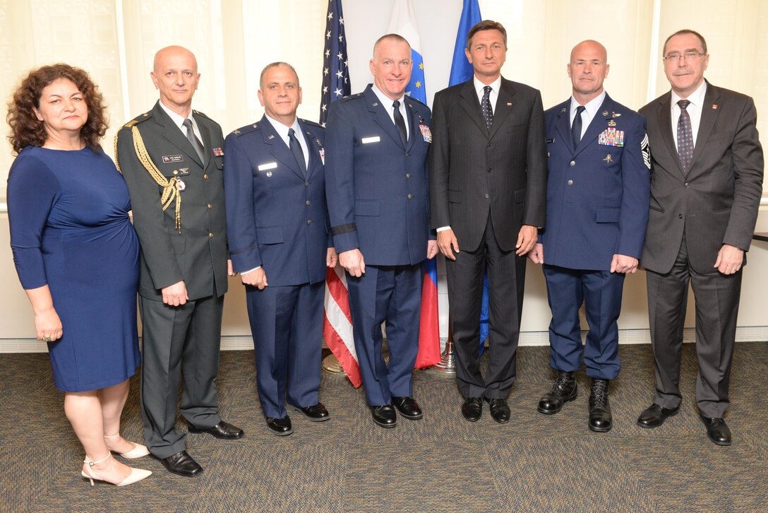 Pictured left to right are Mrs. Nataša Mikuž and Col. Ivo Mikuž, Military Attaché from the Slovenian Embassy in Washington DC, Col. Nicholas Broccoli and Brigadier General Thomas J. Owens II of the New York Air National Guard, President Borut Pahor of Slovenia and Chief Master Sergeant Michael Hewson also of the New York Air National Guard . All were present for the awarding of the Slovenian Medal for Merit in the military field by the May 21, 2017. The ceremony took place at the Permanent Mission of the Republic of Slovenia office to the United Nations, New York. The medals given to the 102nd and 103rd rescue squadrons of the 106th Rescue Wing for thier international rescue mission to render aid to crew members injured in an explosion on board the motor vessel Tamar that began on April 24th. (U.S. Air National Guard Photo by Capt Michael O’Hagan)