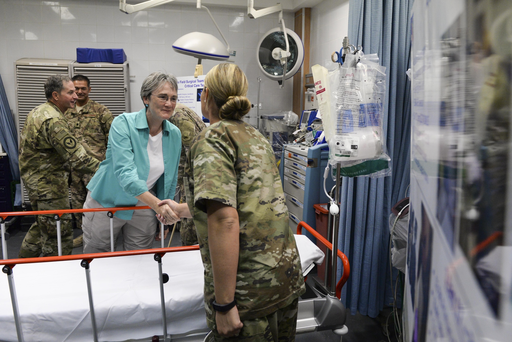 Secretary of the Air Force Heather Wilson shakes hands with U.S. Air Force Tech. Sgt. Ashley Hall, dental assistant assigned to the 379th Expeditionary Medical Group, at Al Udeid Air Base, Qatar, Aug. 15, 2017. During the visit Wilson and Air Force Chief of Staff Gen. David L. Goldfein spent time with Airmen, learning about their contributions to U.S. Air Forces Central Command. (U.S. Air Force photo by Tech. Sgt. Bradly A. Schneider)